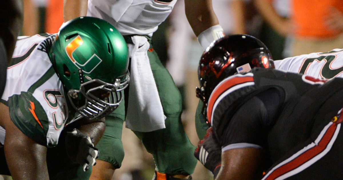 Mario Cristobal opens up on what it means to battle Louisville annually for the Schnellenberger Trophy