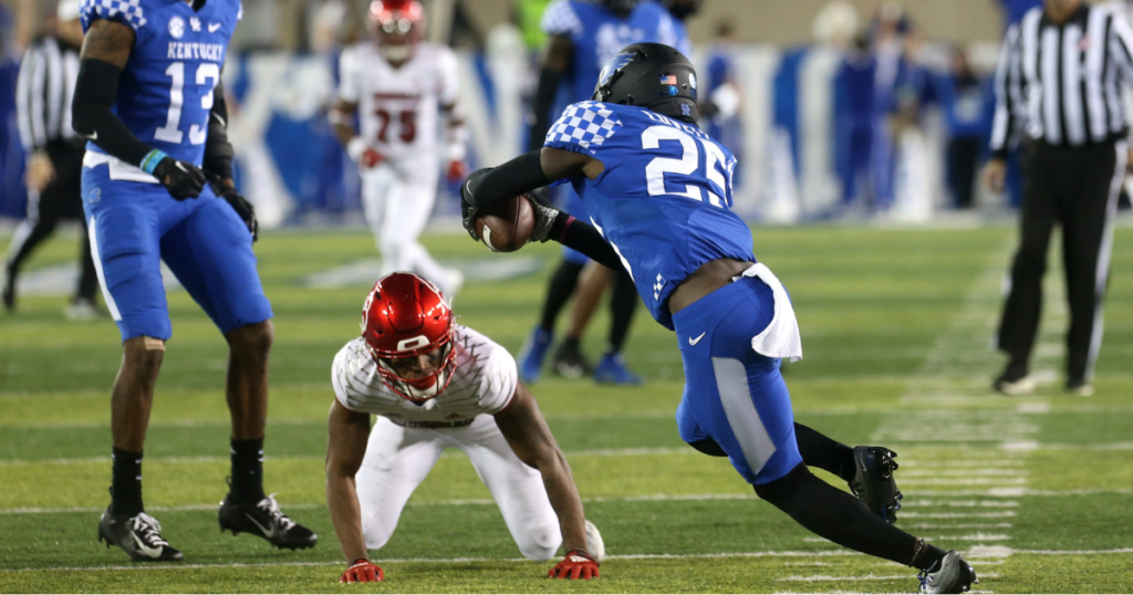 Kentucky's Jordan Lovett catches an interception against Louisville