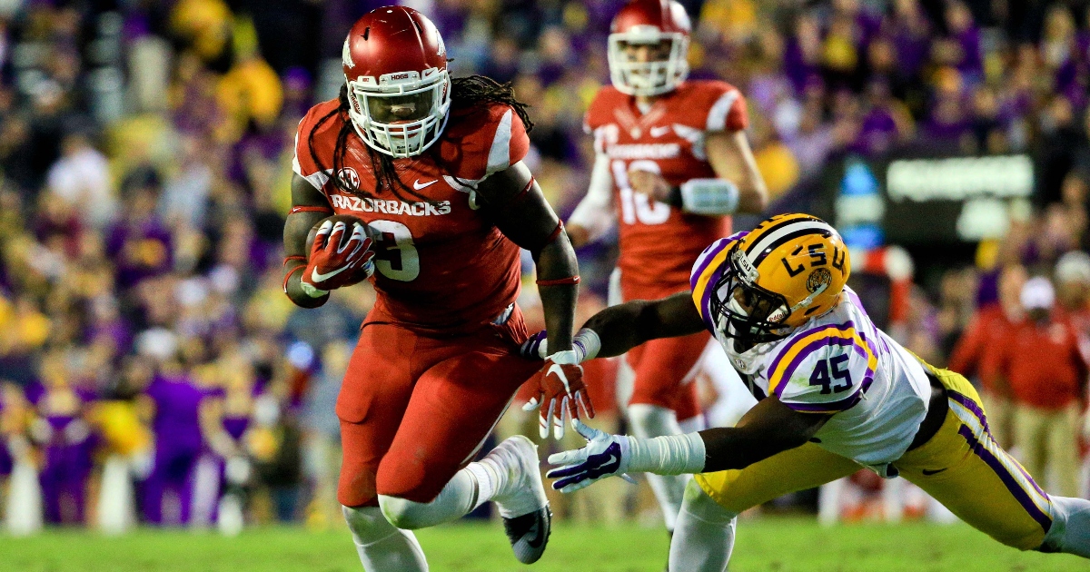 Seattle Seahawks running back Alex Collins carries the ball