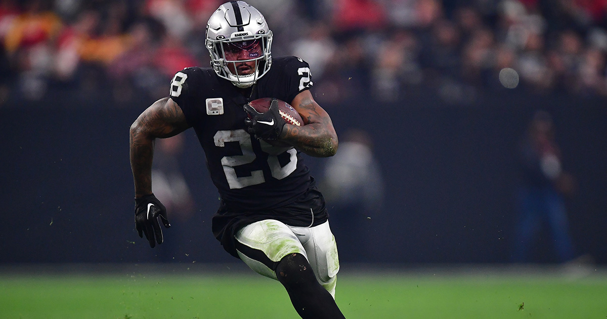 Jacobs carries Raiders to 1st win under McDaniels