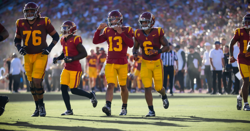 USC quarterback Caleb Williams and the Trojans offense on the field
