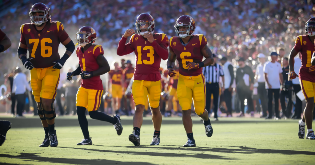 USC quarterback Caleb Williams and the Trojans' offense on the field