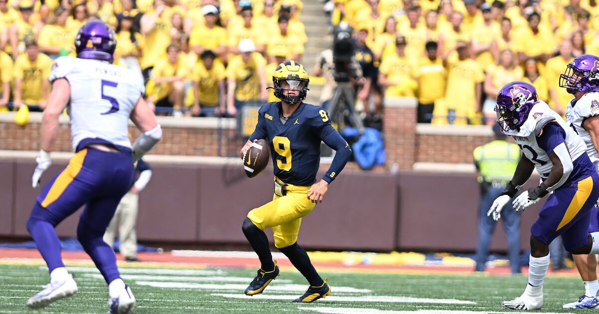 Michigan quarterback J.J. McCarthy warms up in 'Free Harbaugh' shirt after  suspension