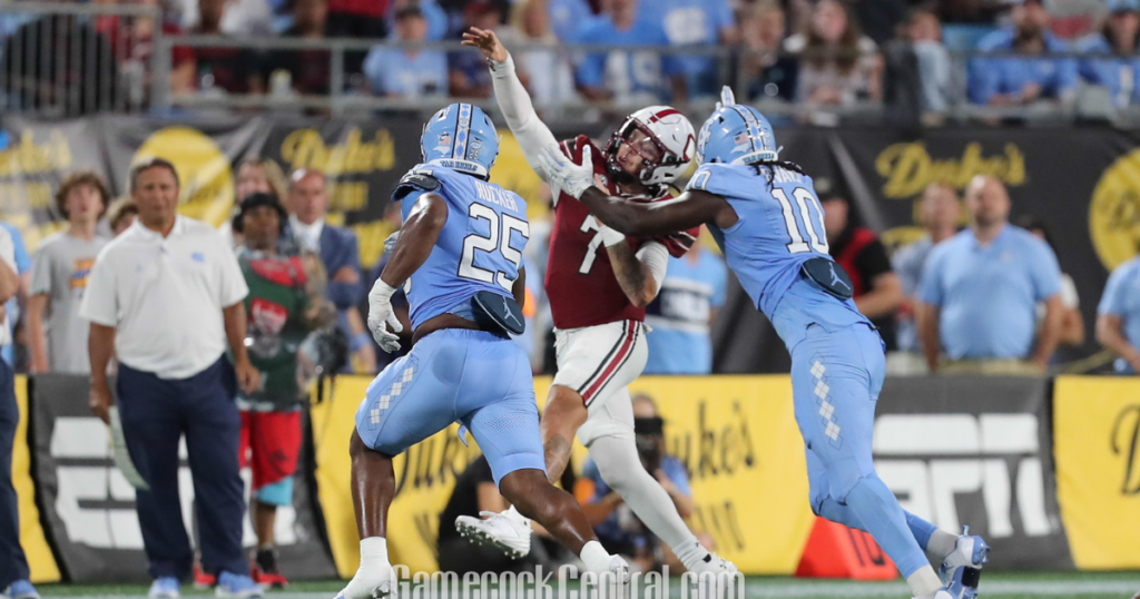 South Carolina quarterback Spencer Rattler pressured against North Carolina