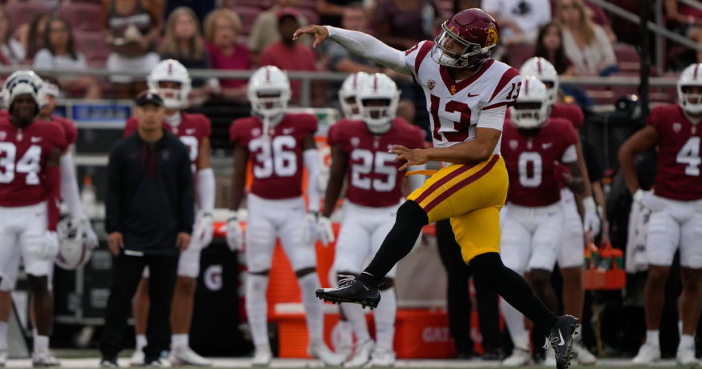 USC Trojans quarterback Caleb Williams throws the ball on the run during the third quarter against the Stanford Cardinal at Stanford Stadium