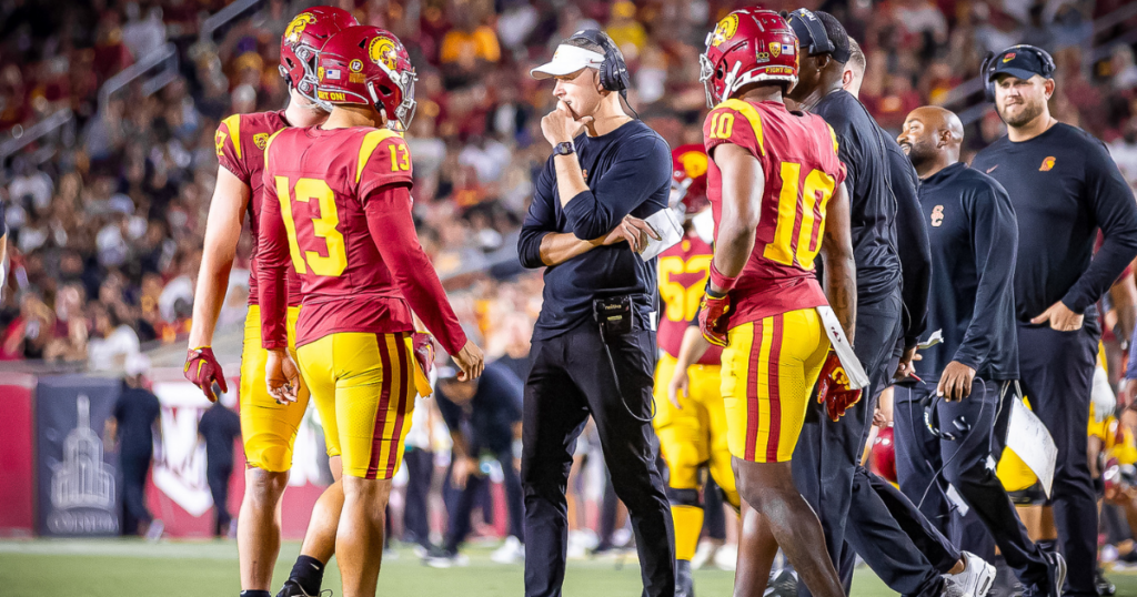 USC head coach Lincoln Riley speaks to quarterback Caleb Williams during a game between the USC Trojans and Stanford Cardinal