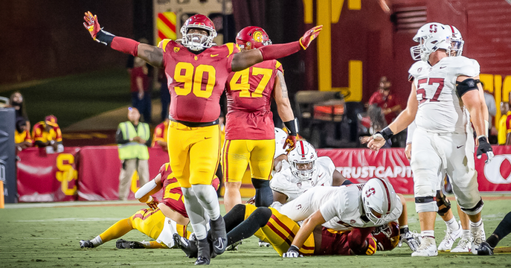 USC defensive lineman Bear Alexander reacts after the Trojan defense stops the Stanford Cardinal during a game at the Los Angeles Memorial Coliseum