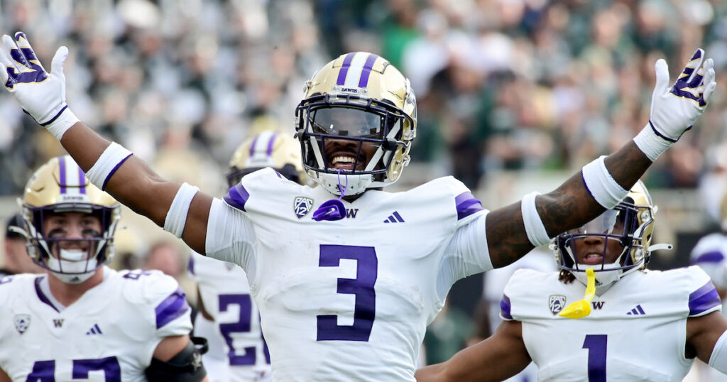 Washington Huskies safety Mishael Powell celebrates an interception