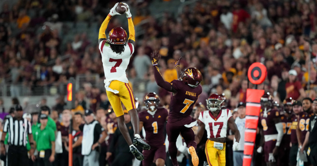 USC Trojans safety Calen Bullock intercepts a pass intended for Arizona State Sun Devils wide receiver Melquan Stovall during the second half at Mountain America Stadium, Home of the ASU Sun Devils