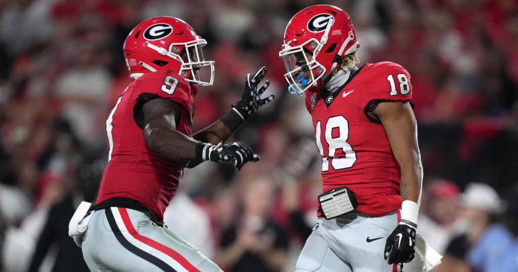 Georgia Bulldogs linebacker Xavian Sorey Jr. and linebacker Troy Bowles celebrate