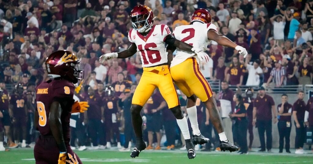 USC Trojans wide receiver Brenden Rice celebrates his touchdown catch with wide receiver Tahj Washington