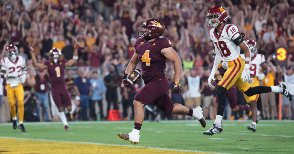 Arizona State Sun Devils running back Cameron Skattebo runs for a touchdown against the USC Trojans during the first half at Mountain America Stadium