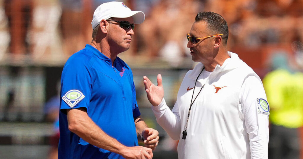 Kansas head coach Lance Leipold and Texas coach Steve Sarkisian