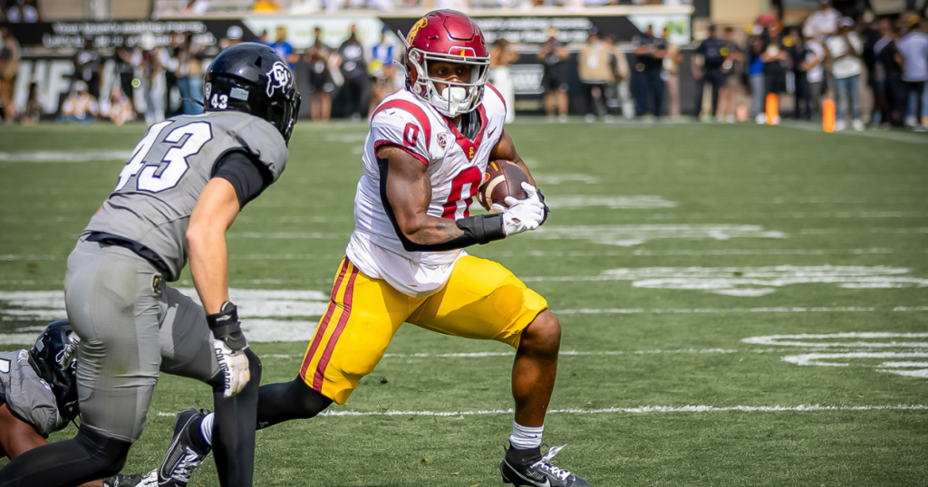 USC running back MarShawn Lloyd carries the ball against the Colorado Buffaloes