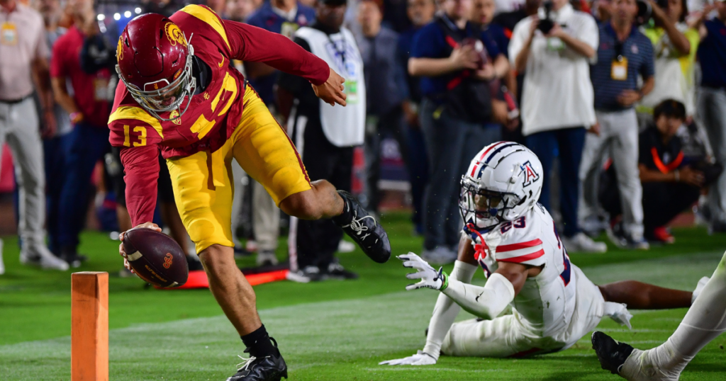 USC quarterback Caleb Williams reaches for the pylon on a two-point conversion attempt in a triple-overtime win against the Arizona Wildcats