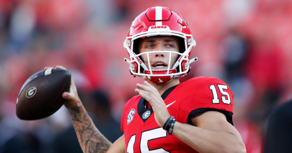 Georgia quarterback Carson Beck (15) warms up before the start of a NCAA college football game against Kentucky in Athens, Ga., on Saturday, Oct. 7, 2023.