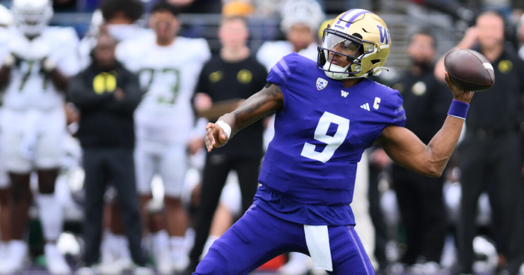 Washington Huskies quarterback Michael Penix Jr. passes the ball