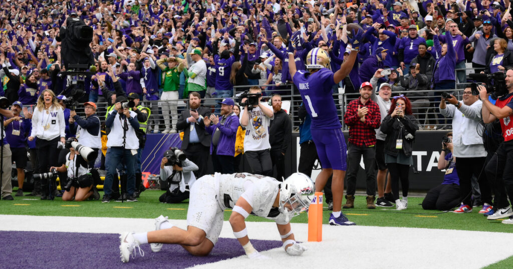 Washington Huskies wide receiver Rome Odunze celebrates scoring a touchdown