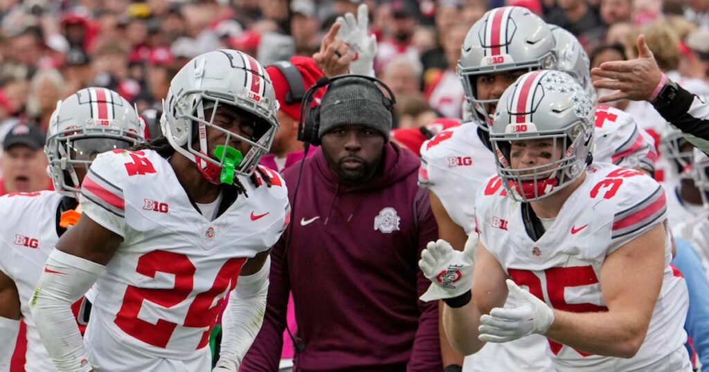 Ohio State Buckeyes cornerback Jermaine Mathews Jr. celebrates after a tackle