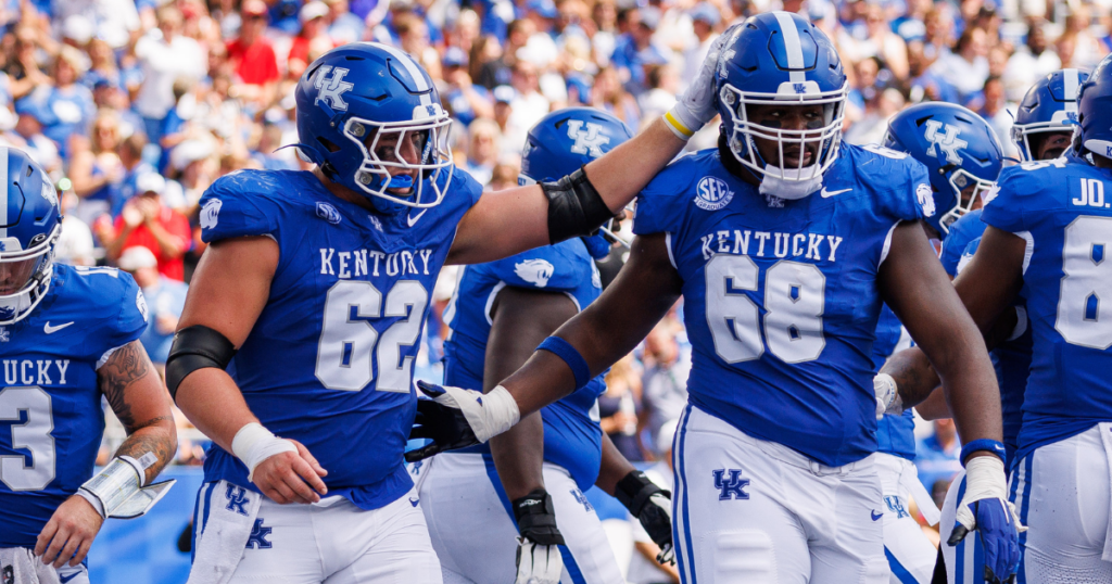 Sep 2, 2023; Lexington, Kentucky, USA; Kentucky Wildcats offensive lineman Jager Burton (62) and offensive lineman Kenneth Horsey (68) celebrate a touchdown during the second quarter against the Ball State Cardinals at Kroger Field.