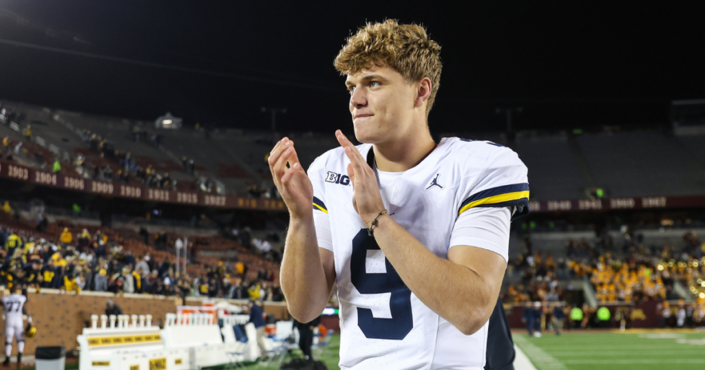 Oct 7, 2023; Minneapolis, Minnesota, USA; Michigan Wolverines quarterback J.J. McCarthy (9) celebrates the win after the game against the Minnesota Golden Gophers at Huntington Bank Stadium.