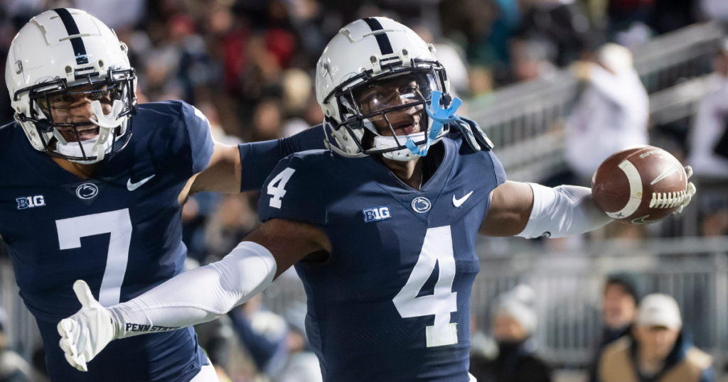 Penn State cornerback Kalen King (4) celebrates with Jaylen Reed (7) after intercepting a pass against Michigan State at Beaver Stadium on Saturday, Nov. 26, 2022, in State College. The Nittany Lions won, 35-16.
