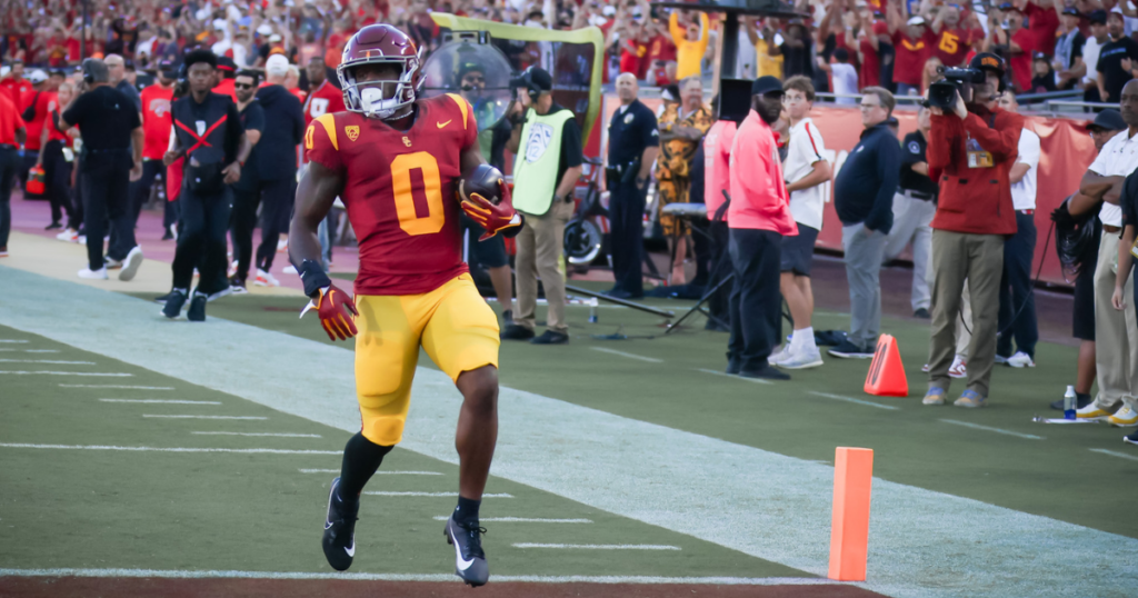 USC running back MarShawn Lloyd carries the ball into the endzone for a touchdown against the Utah Utes