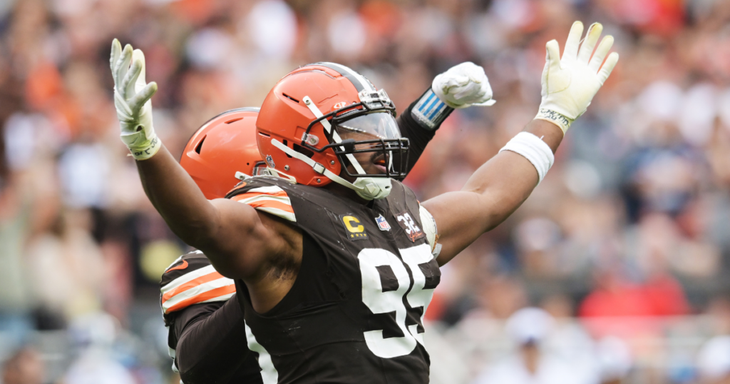 Sep 24, 2023; Cleveland, Ohio, USA; Cleveland Browns defensive end Myles Garrett (95) celebrates after sacking Tennessee Titans quarterback Ryan Tannehill (not pictured) during the second half at Cleveland Browns Stadium.