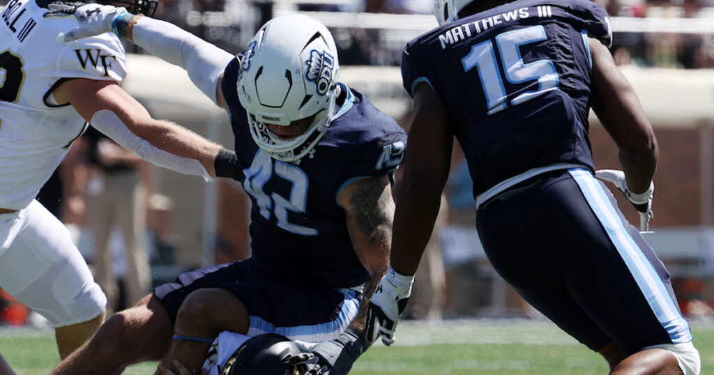 Old Dominion Monarchs linebacker Jason Henderson tries to recover a fumble