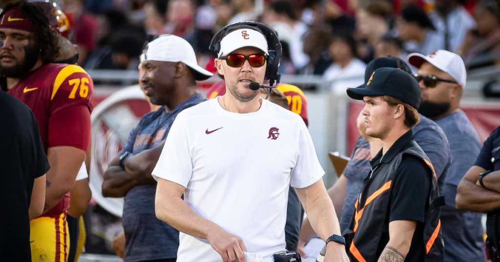 USC head coach Lincoln Riley paces the sideline during a game between the Trojans and Utah Utes at the Los Angeles Memorial Coliseum