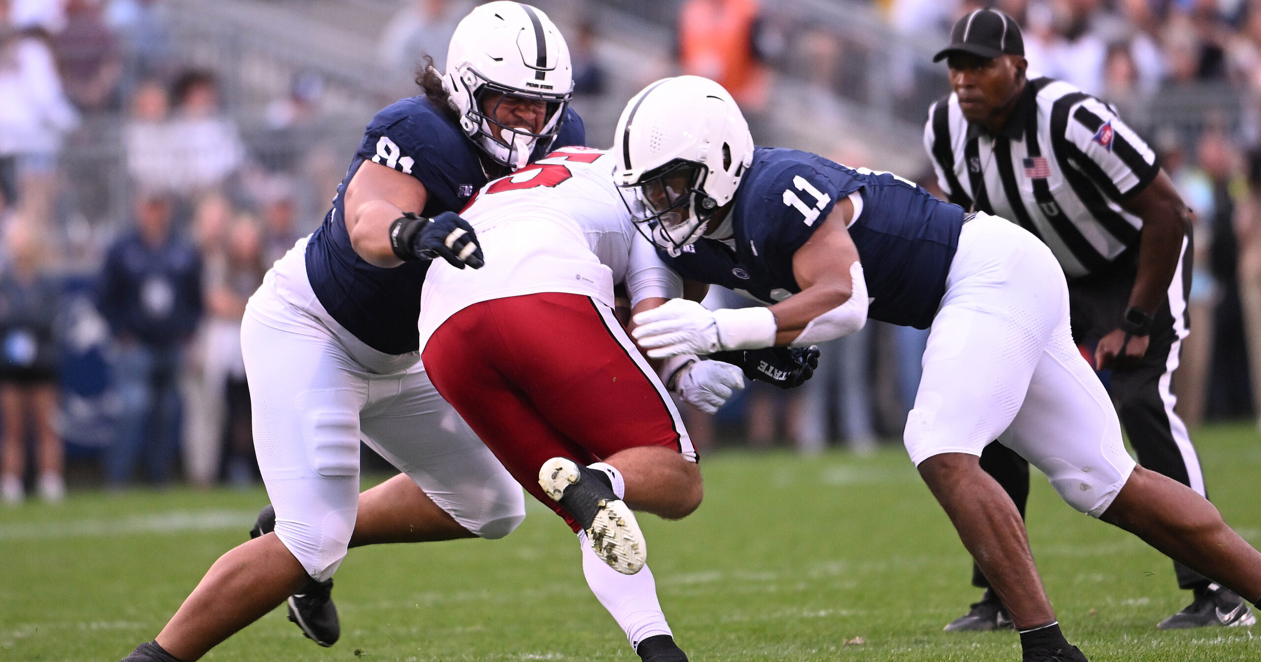 Defensive tackle Dvon Ellies and linebacker Abdul Carter