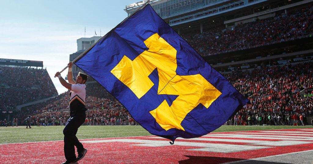 Michigan Wolverines logo on a flag