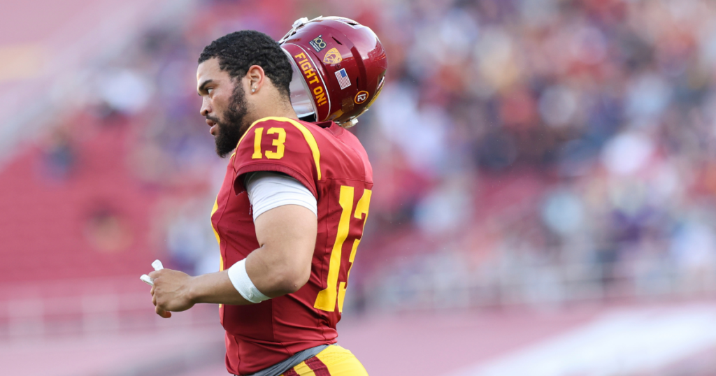 Nov 4, 2023; Los Angeles, California, USA; USC Trojans quarterback Caleb Williams (13) runs towards the bench after a touchdown is scored during the first quarter against the Washington Huskies at United Airlines Field at Los Angeles Memorial Coliseum.