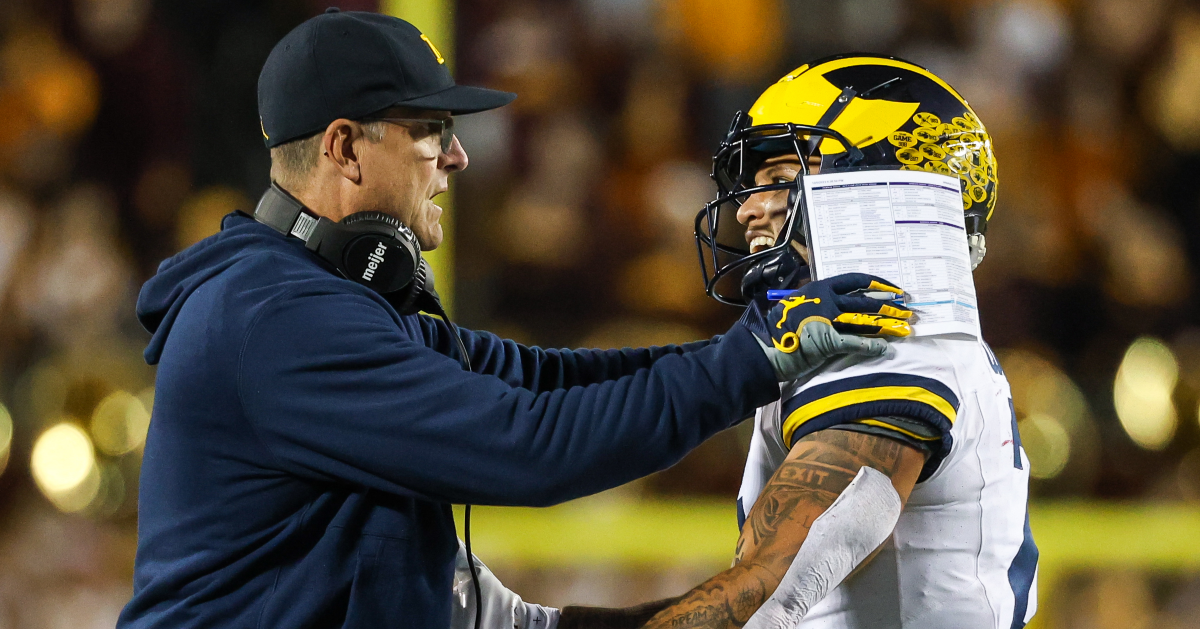 Jim Harbaugh celebrates with Blake Corum amid 'Free Jim Harbaugh