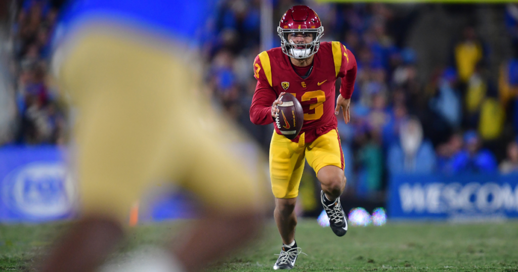 USC Trojans quarterback Caleb Williams runs the ball against the UCLA Bruins during the second half at the Rose Bowl