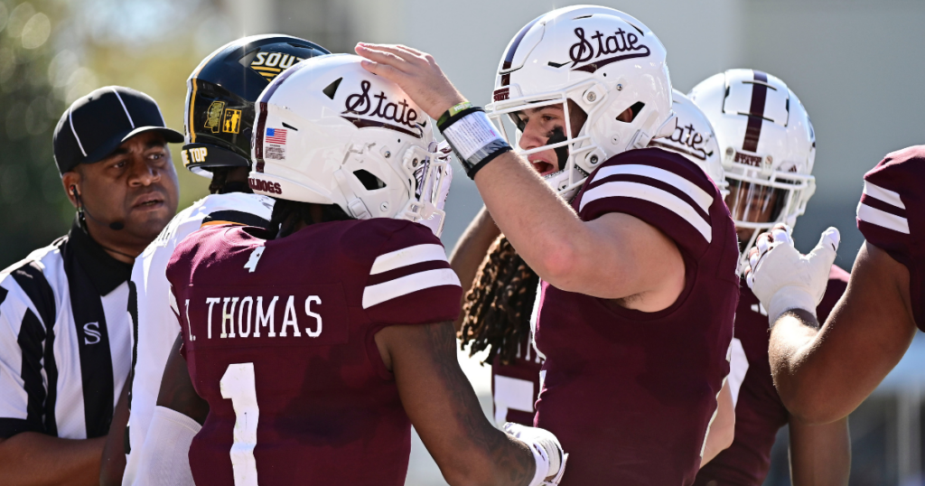 Mississippi State quarterback Will Rogers and receiver Zavion Thomas