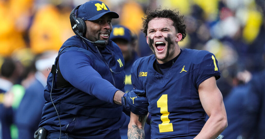 Michigan acting head coach Sherrone Moore and WR Roman Wilson