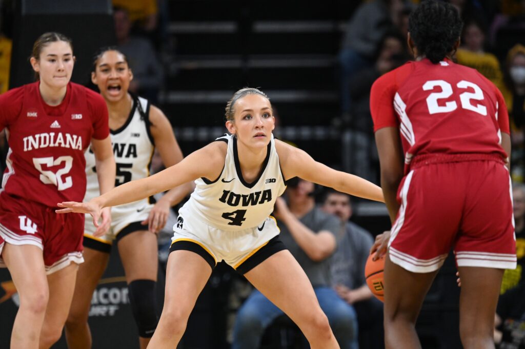 Kylie Feuerbach guards Chloe Moore-McNeil