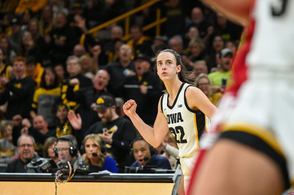 Caitlin Clark celebrates a three-pointer