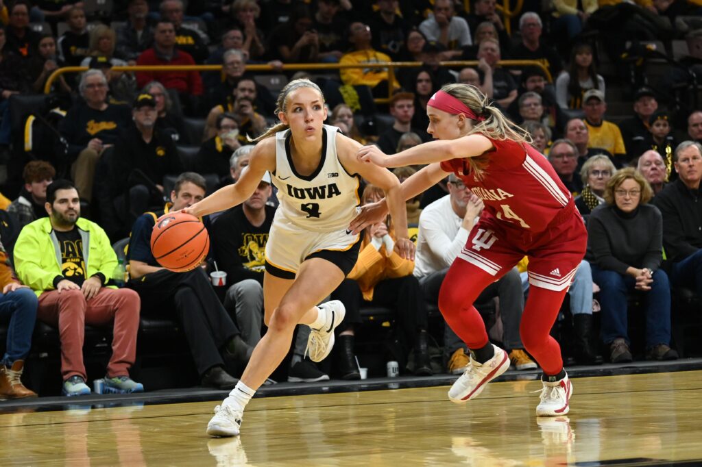 Kylie Feuerbach drives to the basket