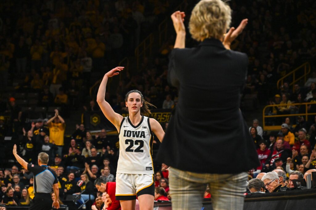 Caitlin Clark checks out of the game in the fourth quarter