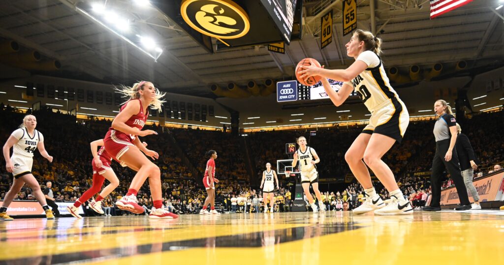 Kate Martin attempts a three-pointer