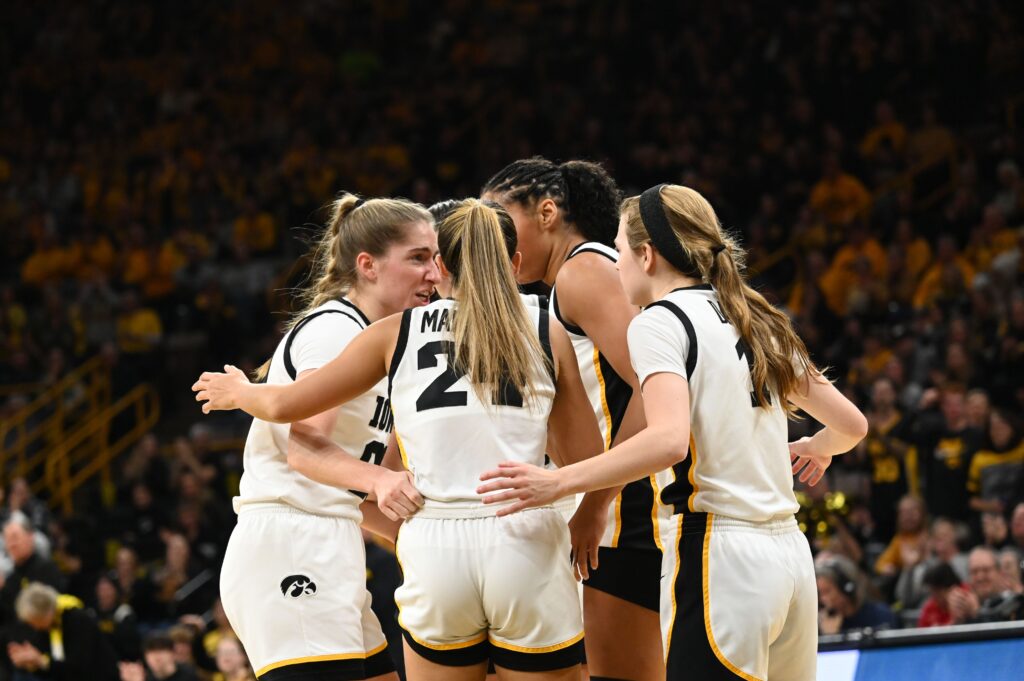 The Hawkeyes huddle before the tipoff