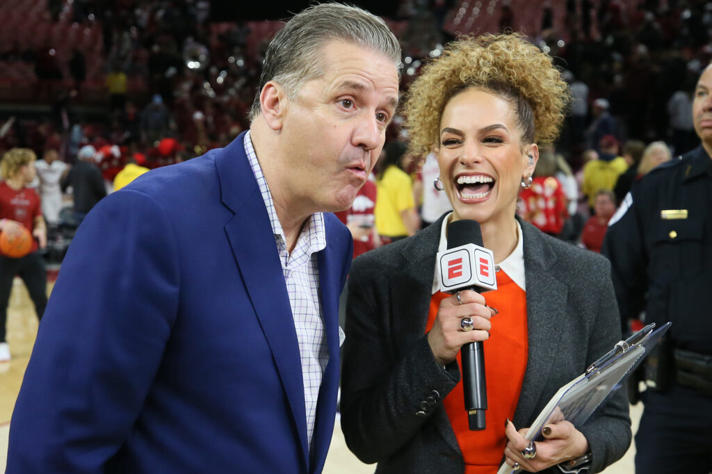 Kentucky head coach John Calipari makes a funny face in an interview with Jess Sims of ESPN