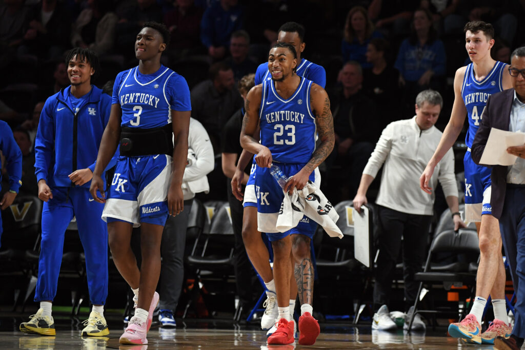 Kentucky Wildcats guard Jordan Burks (23) and teammates celebrate during a time out in the second half against the Vanderbilt Commodores at Memorial Gymnasium