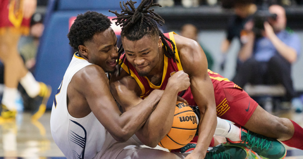 California Golden Bears guard Jalen Celestine (32) and USC Trojans guard Isaiah Collier (1) vie for a loose ball during the second half at Haas Pavilion
