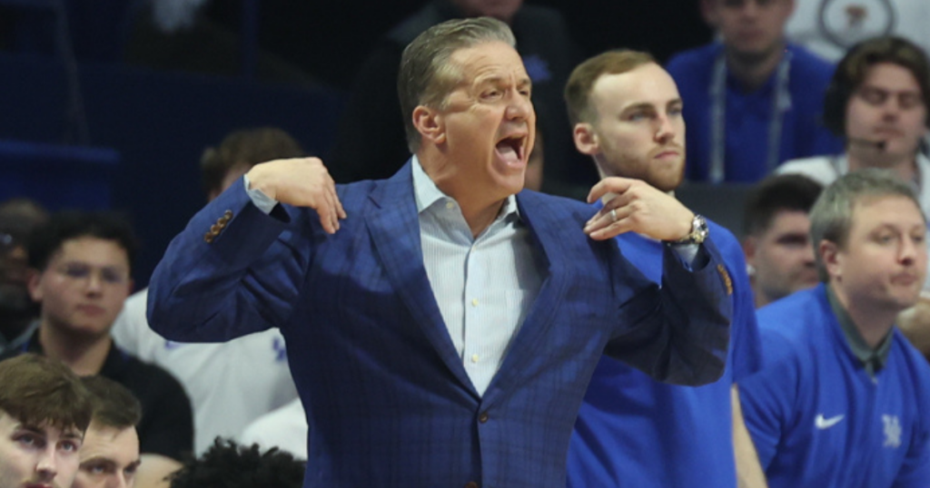 Kentucky coach John Calipari calls a timeout during a game.