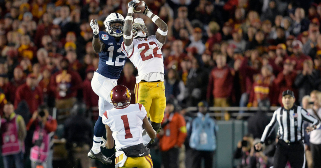 USC Trojans defensive back Leon McQuay III (22) intercepts a pass intended for Penn State Nittany Lions wide receiver Chris Godwin (12) during the second half of the 2017 Rose Bowl