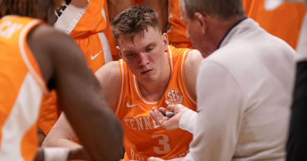 Feb 20, 2024; Columbia, Missouri, USA; Tennessee Volunteers guard Dalton Knecht (3) listens to head coach Rick Barnes against the Missouri Tigers during a time out during the first half at Mizzou Arena.