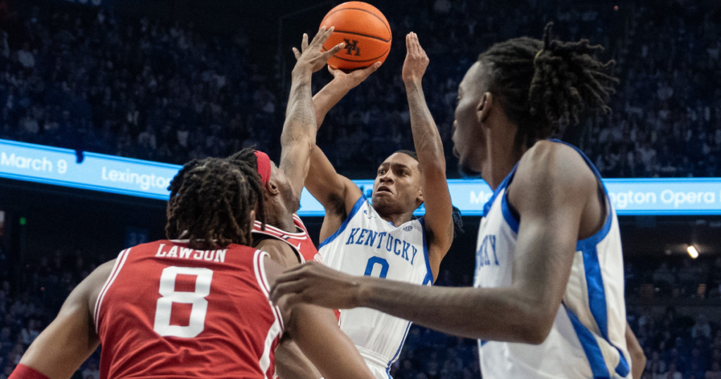 Kentucky Wildcats guard Rob Dillingham (0) attempts a jump shot during their game against the Arkansas Razorbacks